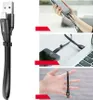 Collage of images showing a black USB/Lightning cable being used to charge a phone, connect to a laptop, and held in a hand. Anteprima dell’immagine prodotto