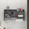 A bathroom shelf with various toiletries and towels. Anteprima dell’immagine prodotto