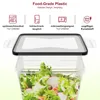 A close-up view of a clear plastic food storage container filled with salad, with its lid partially open. Above the container, there are icons and text highlighting product features. Produktbild-Vorschau