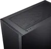A close-up view of the top and side of a black computer case. Produktbild-Vorschau