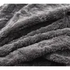 A close-up view of a gray, fuzzy fabric, likely a cover for a beanbag chair. Produktbild-Vorschau