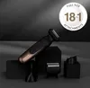 A Remington hair clipper and its attachments are displayed on black pedestals against a dark background. Produktbild-Vorschau
