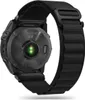 The back of a black smartwatch with a fabric strap. Náhled obrázku produktu