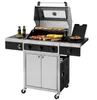 A stainless steel gas grill with the lid open, showing food cooking on the grates. Produktbild-Vorschau