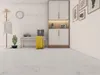 A hallway or entryway with a coat rack, bench, and storage cabinet. Produktbild-Vorschau