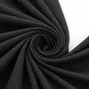 A close-up, swirled view of black fabric. Náhľad obrázku produktu