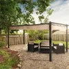 A backyard scene with a pergola and outdoor furniture. Podgląd zdjęcia produktu