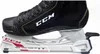 A close-up side view of a black CCM hockey skate attached to a white and red skate blade protector. Voir les images du produit