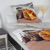 A bed with a duvet cover and pillow featuring a construction vehicle (excavator) print. Náhľad obrázku produktu