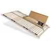 A wooden bed slatted base is shown laid out on a white background, with a cardboard box containing assembly parts to the right.