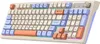 A close-up, angled view of a mechanical keyboard with a cream-colored casing and multi-colored keycaps. Produktbild-Vorschau