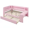 A pink daybed with a pull-out trundle bed is shown from a slightly elevated, diagonal angle against a white background. Produktbild-Vorschau