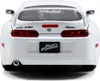 The rear view of a white toy model of a 1995 Toyota Supra. Anteprima dell’immagine prodotto