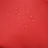 A close-up of a red fabric surface with water droplets. Produktbild-Vorschau