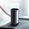 A car air heater is placed on the dashboard of a car. Anteprima dell’immagine prodotto