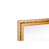 A close-up of a gold-colored wooden mirror frame. Produktbild-Vorschau