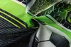 A close-up of a fabric with a soccer ball pattern. Produktbild-Vorschau