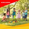 Children playing outdoor games in a park. Produktbild-Vorschau