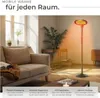 A living room scene with a sofa, coffee table, and a floor heater emitting orange light. Produktbild-Vorschau