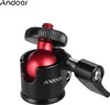 A close-up product shot of a mini ball head tripod mount. Náhled obrázku produktu