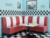 A corner booth in a retro diner setting. Produktbild-Vorschau