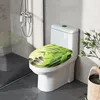 A toilet seat with a bamboo and stone art design in a modern bathroom. Produktbild-Vorschau