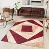 A living room scene with a rug, sofa, and armchair. Anteprima dell’immagine prodotto
