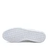 The bottom view of a white Puma sneaker. Produktbild-Vorschau