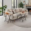 A living room scene with a sofa and two side tables. Produktbild-Vorschau