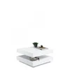 A white, two-tiered coffee table with a plant and books on top. Náhľad obrázku produktu