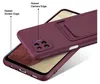 A close-up shot of a purple phone case with a cardholder slot, placed on top of a phone. Produktbild-Vorschau