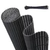 A rolled-up black PVC privacy screen and a bundle of black zip ties on a white background. Podgląd zdjęcia produktu