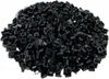 A pile of small black LEGO bricks. Produktbild-Vorschau