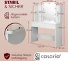 A white vanity table with a mirror and LED lights, shown with dimensions and feature callouts. Produktbild-Vorschau