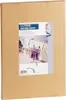 A cardboard box with a product label showing a clothes drying rack attached to a radiator. Produktbild-Vorschau