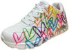 A single white sneaker with colorful heart designs. Produktbild-Vorschau