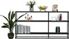 A black metal shelf unit with various decorative items and books. Produktbild-Vorschau