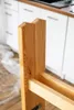 Close-up of wooden ladder parts in a kitchen setting. Produktbild-Vorschau