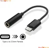 A black USB Type-C to 3.5mm headphone adapter is shown, with icons and text explaining its function. Produktbild-Vorschau