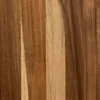 A close-up view of a wooden surface, showing the grain and texture of the wood. Podgląd zdjęcia produktu