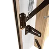 A close-up view of the metal hinges and spring mechanism of a wooden attic ladder. Podgląd zdjęcia produktu