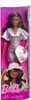 A Barbie doll in a silver sequined dress and a white cowboy hat, displayed in its packaging. Produktbild-Vorschau