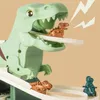 A toy dinosaur slide with small dinosaur figures on it. Náhled obrázku produktu