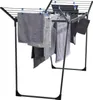 A drying rack with towels hanging on it. Produktbild-Vorschau