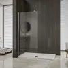 A modern bathroom with a glass shower enclosure. Produktbild-Vorschau