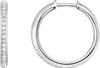 A pair of silver hoop earrings with white stones. Voir les images du produit