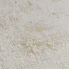 A close-up textured view of wallpaper with a white raised pattern on a light gold background. Produktbild-Vorschau
