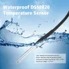 A waterproof temperature sensor probe submerged in water with splashes. Produktbild-Vorschau