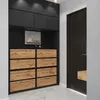 A modern entryway with a black and wood grain shoe cabinet and a dark wood door. Podgląd zdjęcia produktu