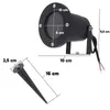 A product shot of a black LED garden spotlight and its accompanying ground spike, with dimensions indicated by measurement lines and text. Anteprima dell’immagine prodotto